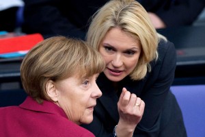  Chancellor Angela Merkel, left, and Manuela Schwesig, the minister of family affairs who helped a law requiring more women on corporate boards clear legal and political hurdles in Germany.  Credit Soeren Stache/European Pressphoto Agency 