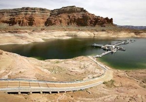 Environmentalists have long-lamented the damming of scenic Glen Canyon in the early 1960's to create the 186-mile-long Lake Powell. The U.S. Bureau of Reclamation is evaluating four proposals to manage the drought on the Colorado River, which supplies water and power to millions of people in the western states. The bureau has warned that shortages are possible as early as 2010. If the water drops too far, power generators at the dams will become inoperable. Credit: ozarker.org