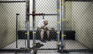 A mentally ill patient in jail, one of hundreds of thousands.