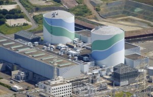 This aerial photo shows reactors of No. 1, right, and No. 2, left, at the Sendai Nuclear Power Station in Satsumasendai, Kagoshima prefecture, southern Japan, Tuesday, Aug. 11, 2015. Kyushu Electric Power Co. said Tuesday, Aug. 11, 2015, it had restarted the No. 1 reactor at its Sendai nuclear plant as planned. The restart marks Japan's return to nuclear energy four-and-half-years after the 2011 meltdowns at the Fukushima Dai-ichi nuclear power plant in northeastern Japan following an earthquake and tsunami. Credit: Kyodo News via AP