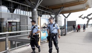  Armed police officers patrol outside a terminal building at Oslo Airport July 24, 2014.  Credit: Audun Braastad/Reuters 