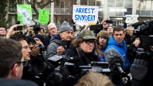 Film-maker Michael Moore, who is from Flint, attended a rally in the city on Saturday. Credit: Jake May/The Flint Journal 