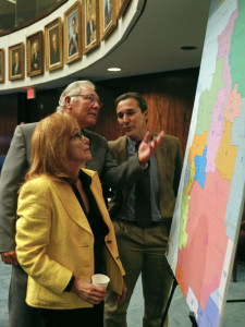  Florida state Sens. (from left) Eleanor Sobel, Greg Evers and Rene Garcia discuss a congressional redistricting map on the floor of the Senate in 2014. Credit: Phil Sears/AP