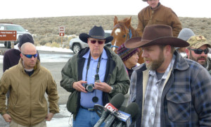 Jon Ritzheimer (left) and Ammon Bundy (right, speaking at the microphone) at their daily press conference. Credit: Spencer Sunshine.