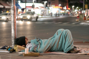 Homeless elder sleeping on the streets