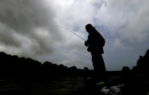 More than a dozen states have advisories on eating fish from rivers, streams, and lakes, due to mercury contamination.  Credit: Charlie Neibergall/AP