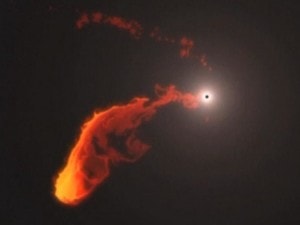 A simulation of the cloud of gas getting swallowed by the black hole  Credit: The Independent