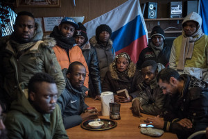  Migrants from African countries in a hostel in Kandalaksha, waiting to cross into Finland. The flow of refugees and migrants on the Arctic route has added a hefty dose of geopolitical anxiety. Credit Sergey Ponomarev/The New York Times 