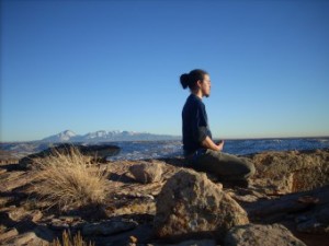 field-guide-meditating-with-sleeping-ute-in-background-340x255