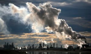  View of smoke plumes emitted from the Syncrude upgrader plant north of Fort McMurray, northern Alberta, Canada. Credit: Jiri Rezac