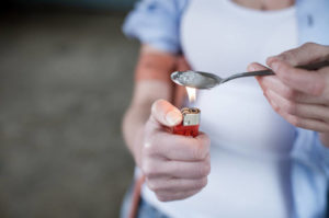 melting heroin in a spoon