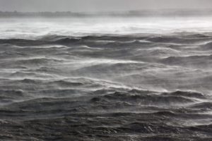 Rolling waves driven by cyclone Christian appear in the Elbe estuary near the North Sea close to Brunsbuettel, northern Germany. Credit: EPA/Christian Charisius