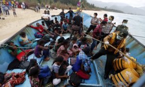  Sri Lankan migrants refuse to leave Indonesian waters and demand fuel to continue their journey to Australia after becoming stranded at Lhoknga Beach, Aceh, Indonesia, in June 2016. Credit: Hotli Simanjuntak/EPA