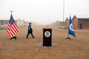 US Immigration and Customs Enforcement public relations officials prepare for a visit by Secretary of Homeland Security Jeh Johnson at a new detention facility specially designed to imprison migrant women and their children as their deportation cases move through the courts, in Dilley, Texas, December 15, 2014. Credit: Jennifer Whitney / The New York Times