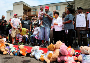  Michael Brown Sr., center, addressed a crowd during a memorial ceremony in Ferguson, Mo., on Tuesday marking two years since the death of his son, Michael Brown. Credit David Carson/St. Louis Post-Dispatch/AP