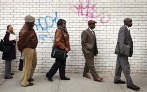  Job seekers stand in line to attend the Dr. Martin Luther King Jr. career fair held by the New York State Department of Labor. Credit: Reuters / Lucas Jackson