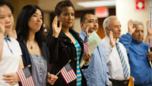 Immigrants taking Oath of Allegiance Credit: CNN