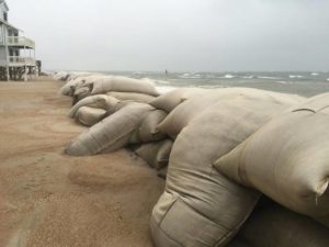 Sandbags lie in disarray along North Topsail Beach Credit: John Althouse AP