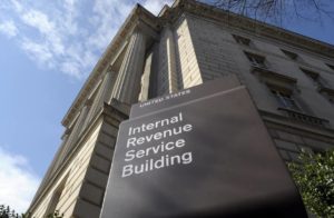 The Internal Revenue Service building in Washington. This year the standard deduction is $6,300 for most single income tax filers and $12,600 for most married couples. Credit: AP