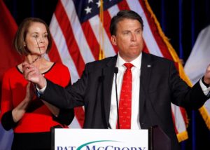 North Caroline Gov. Pat McCrory vows to contest the results of North Carolina’s gubernatorial election, while his wife, Ann, looks on. Credit: Jonathan Drake/Reuters